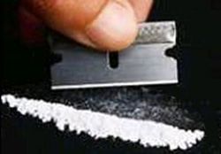 Tritatura dei cristalli di coca
